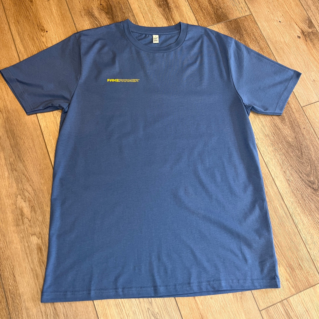 Official Fake Farmer® Unisex Eco Blue T-Shirt - Yellow Logo